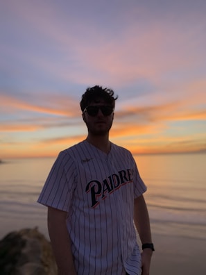 Sunset view over Riverside with a fan wearing a classic British football jersey.