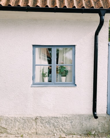 white wooden framed glass window