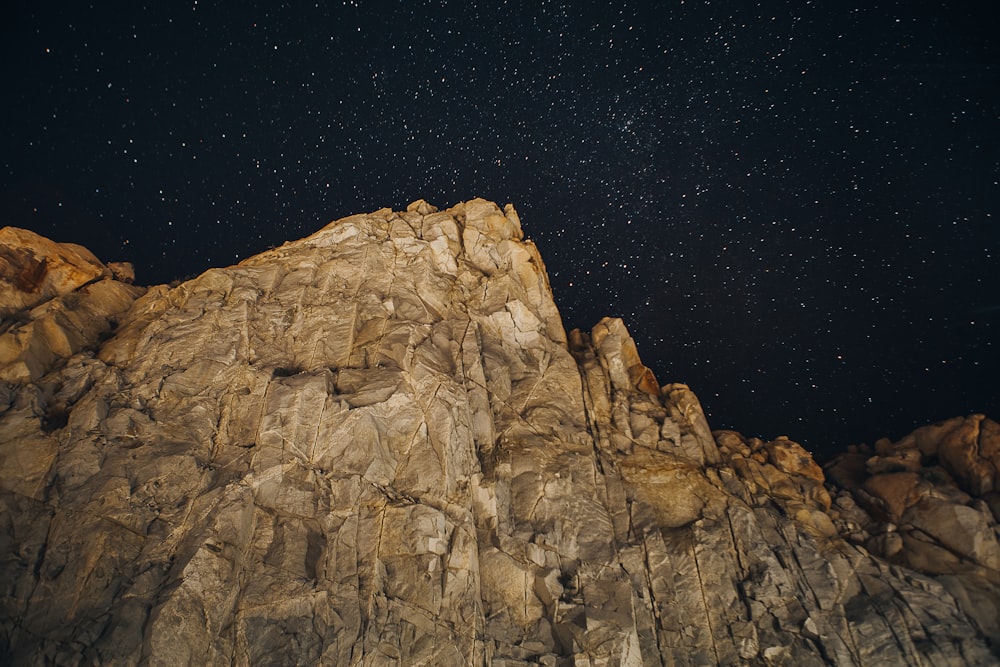 brown rock formation during night time