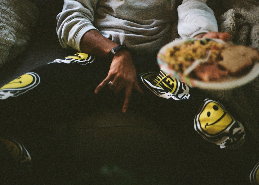 Tired person eating snacks late at night
