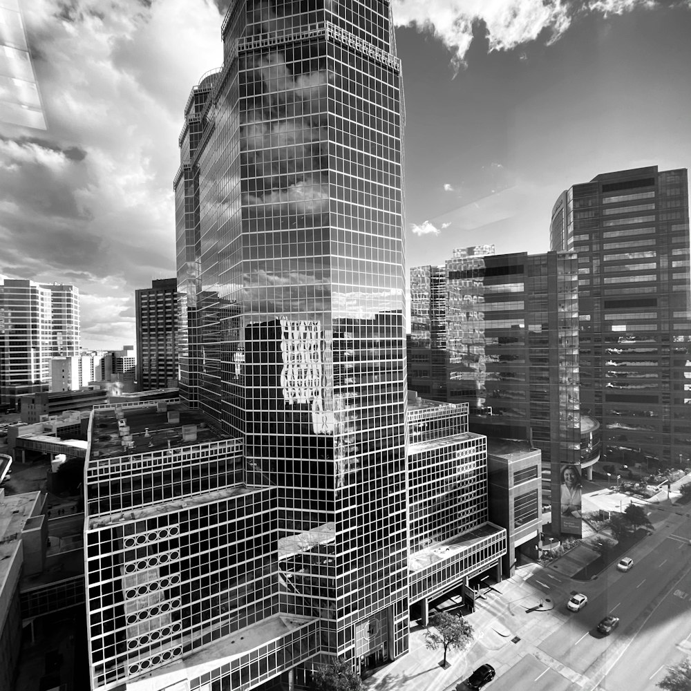 grayscale photo of city buildings