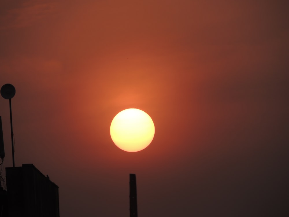 silhouette of building during sunset