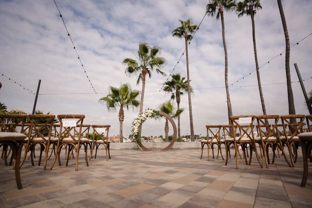 brown wooden table and chairs on brown concrete floor