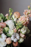 A vibrant bouquet of fresh seasonal flowers in soft pastel tones, perfect for any celebration.