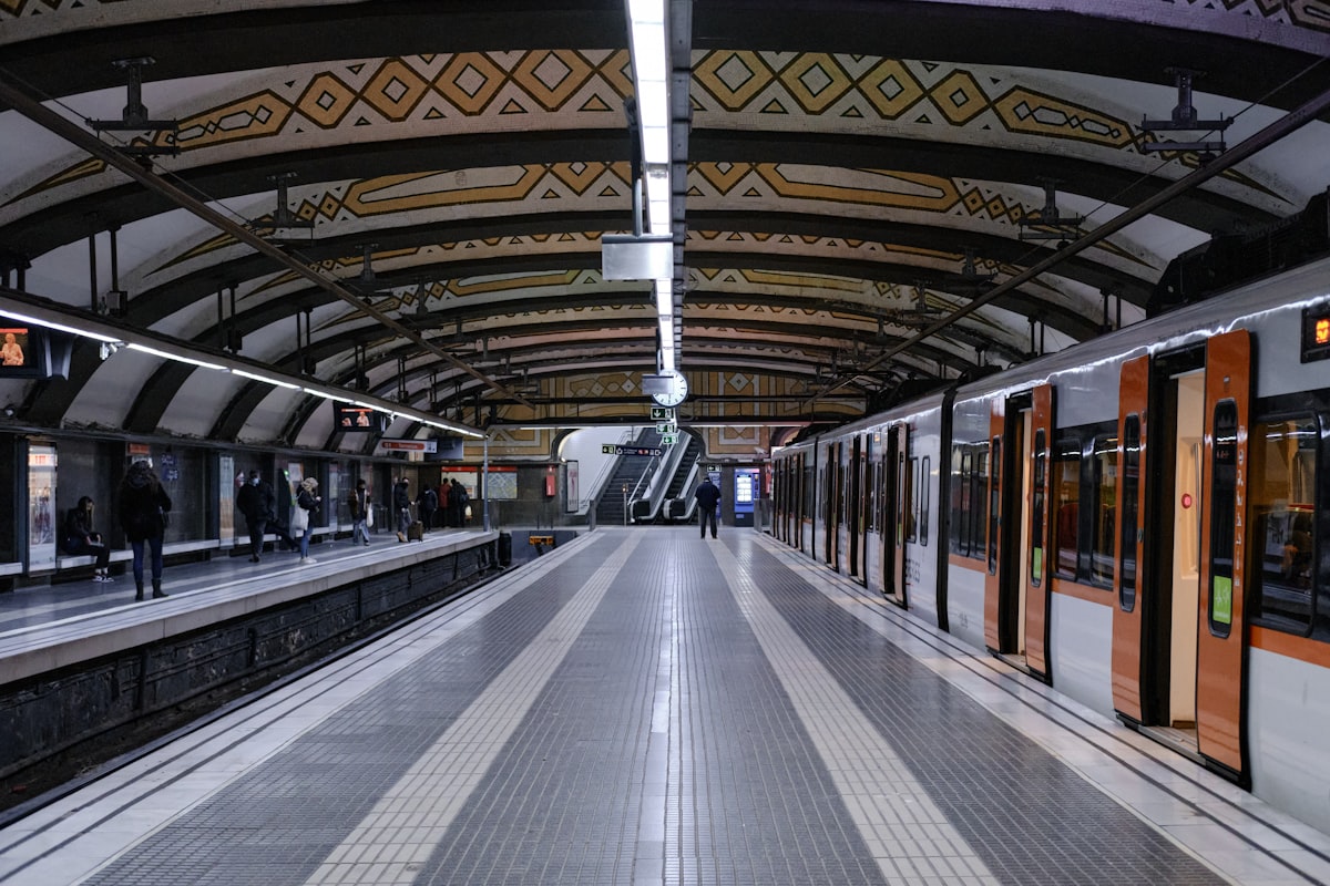 Modern underground metro station platform with clean contemporary architecture