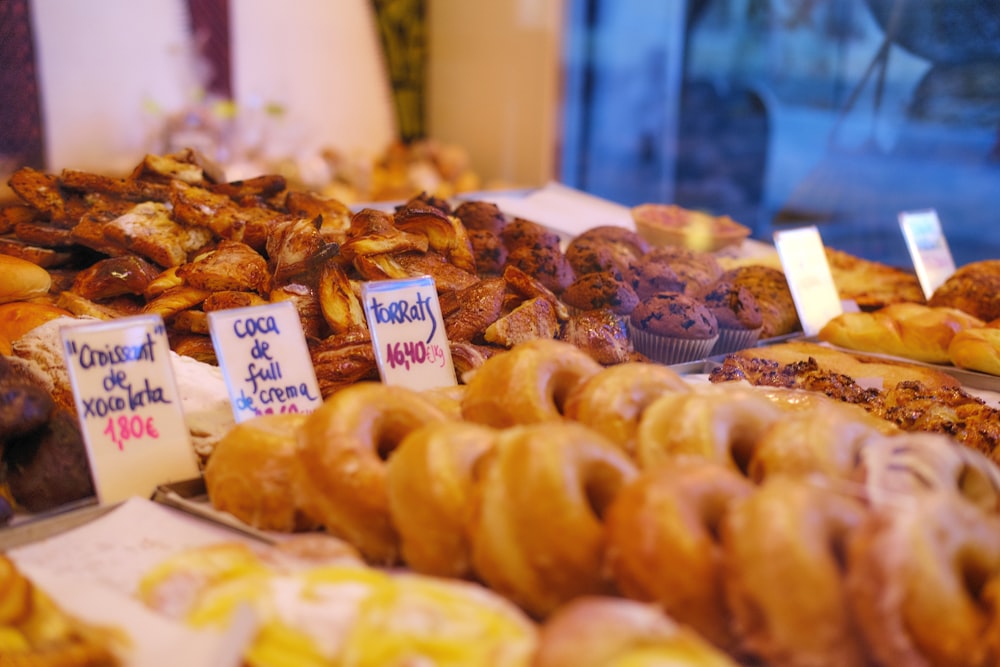 brown doughnuts on white tray