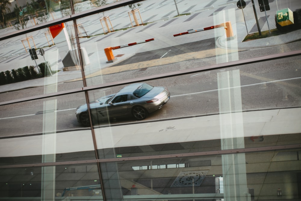 black sedan on road during daytime