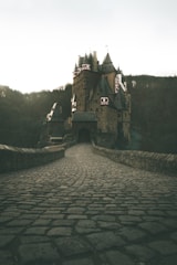 black and gray castle on mountain