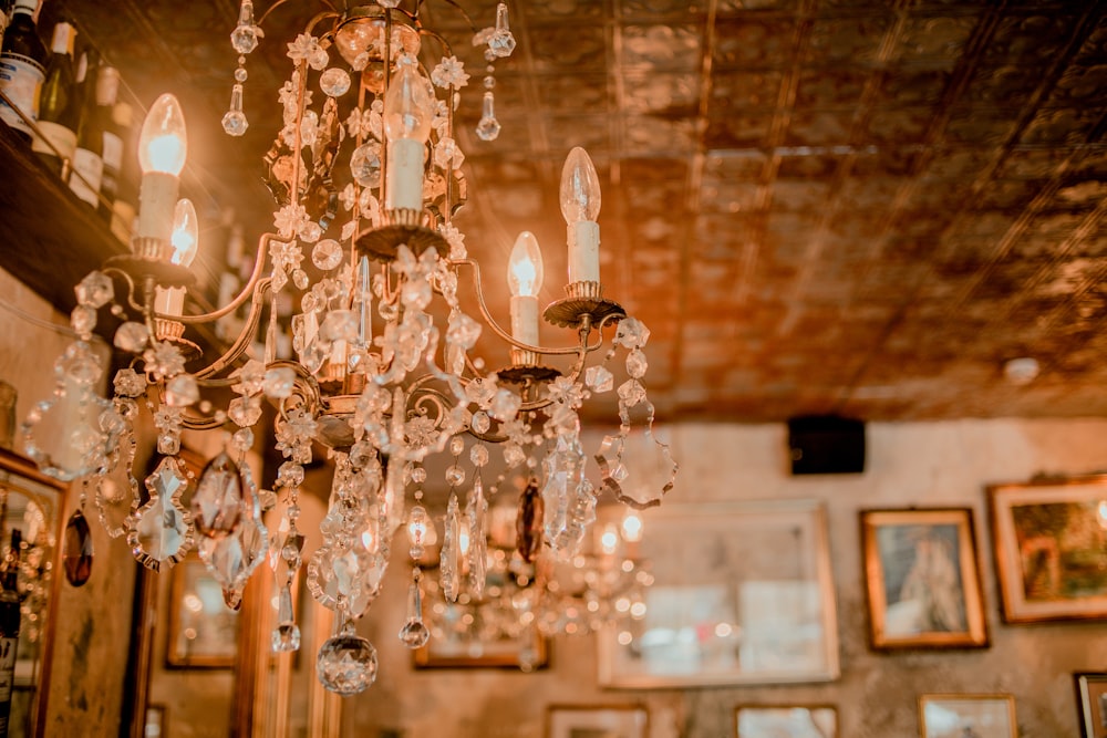 gold and white uplight chandelier