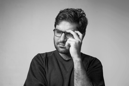 A thoughtful philosopher pondering life's mysteries.