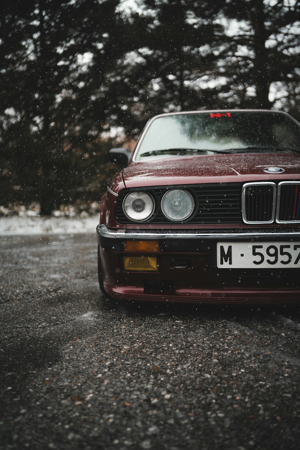red bmw m 3 on road