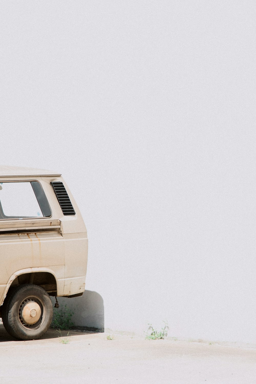 white van on white surface