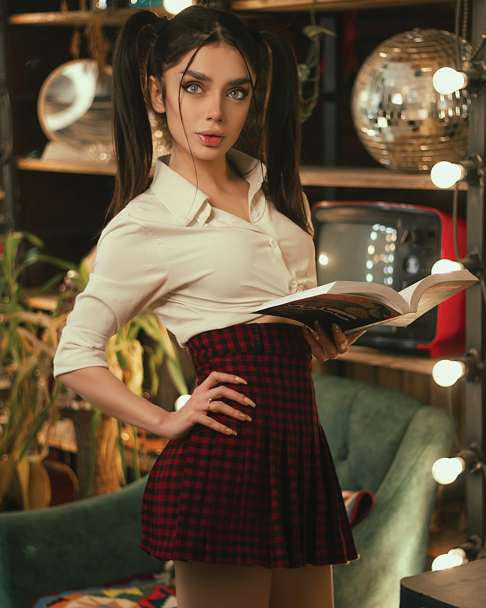 woman in white long sleeve shirt and red skirt