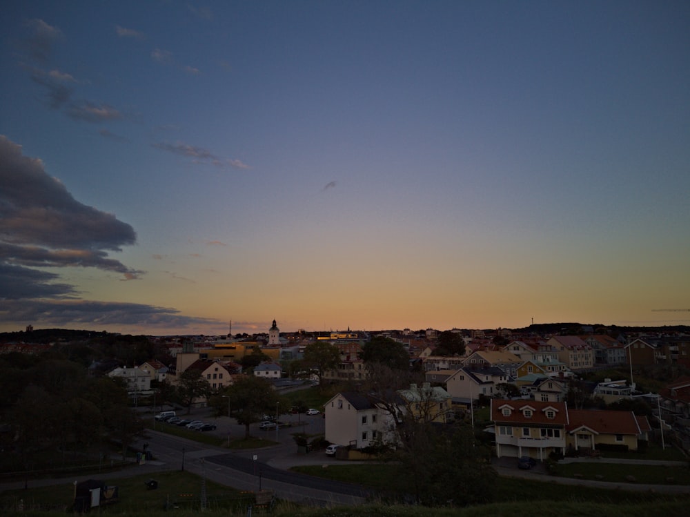 white and brown houses under blue sky during daytime