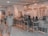 A cozy café interior with a rustic and bohemian decor style, featuring rattan chairs and pendant lights, a counter with a barista, and patrons sitting on high stools. The walls are adorned with artworks and potted plants, creating a warm and inviting atmosphere.