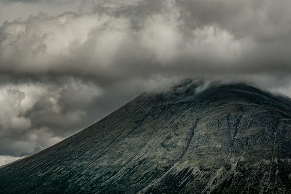 Gray and white clouds over green and gray mountain — Scottish Highlands, United Kingdom