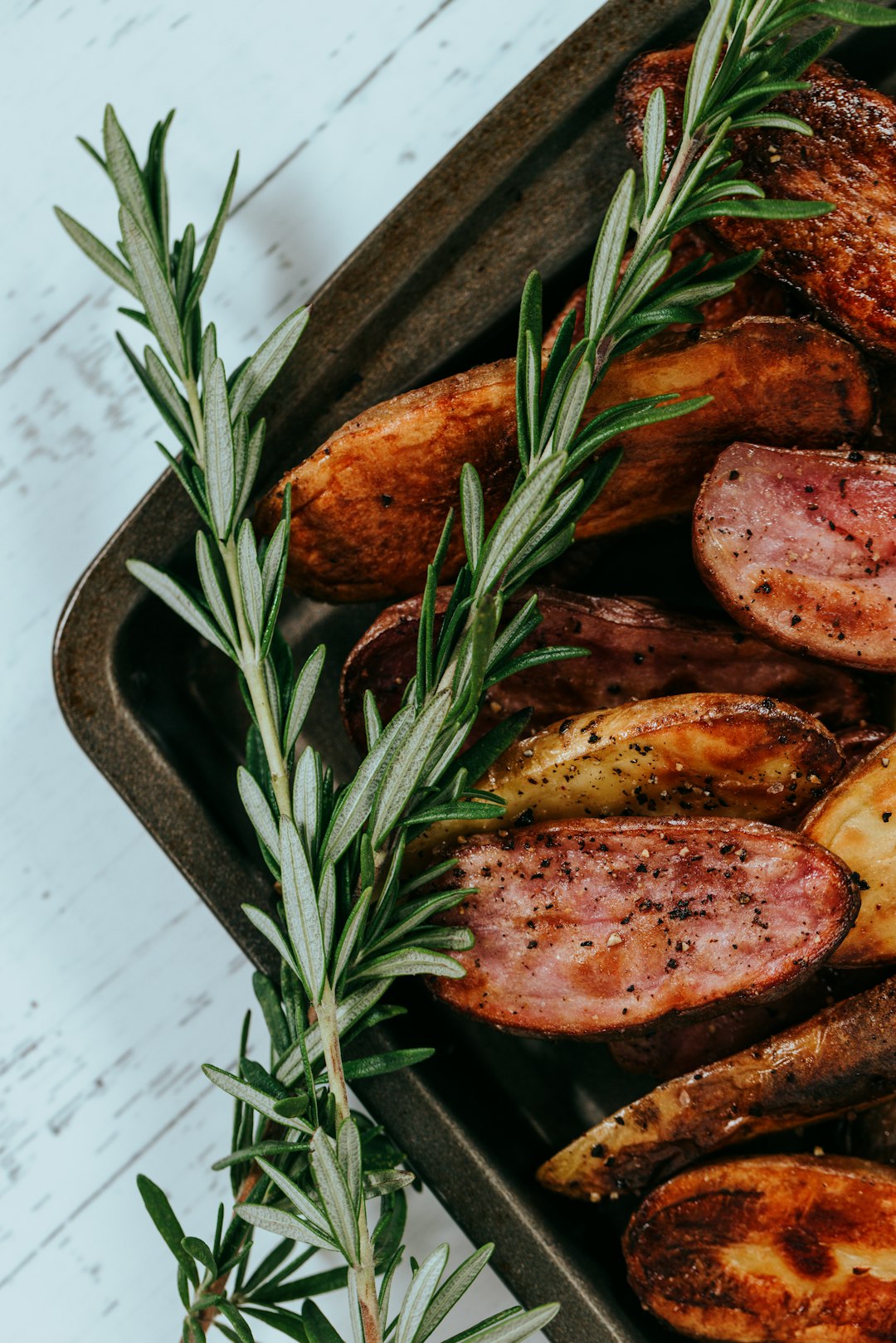 grilled meat on black tray