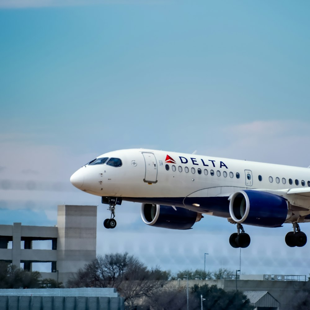 white passenger plane in the sky during daytime