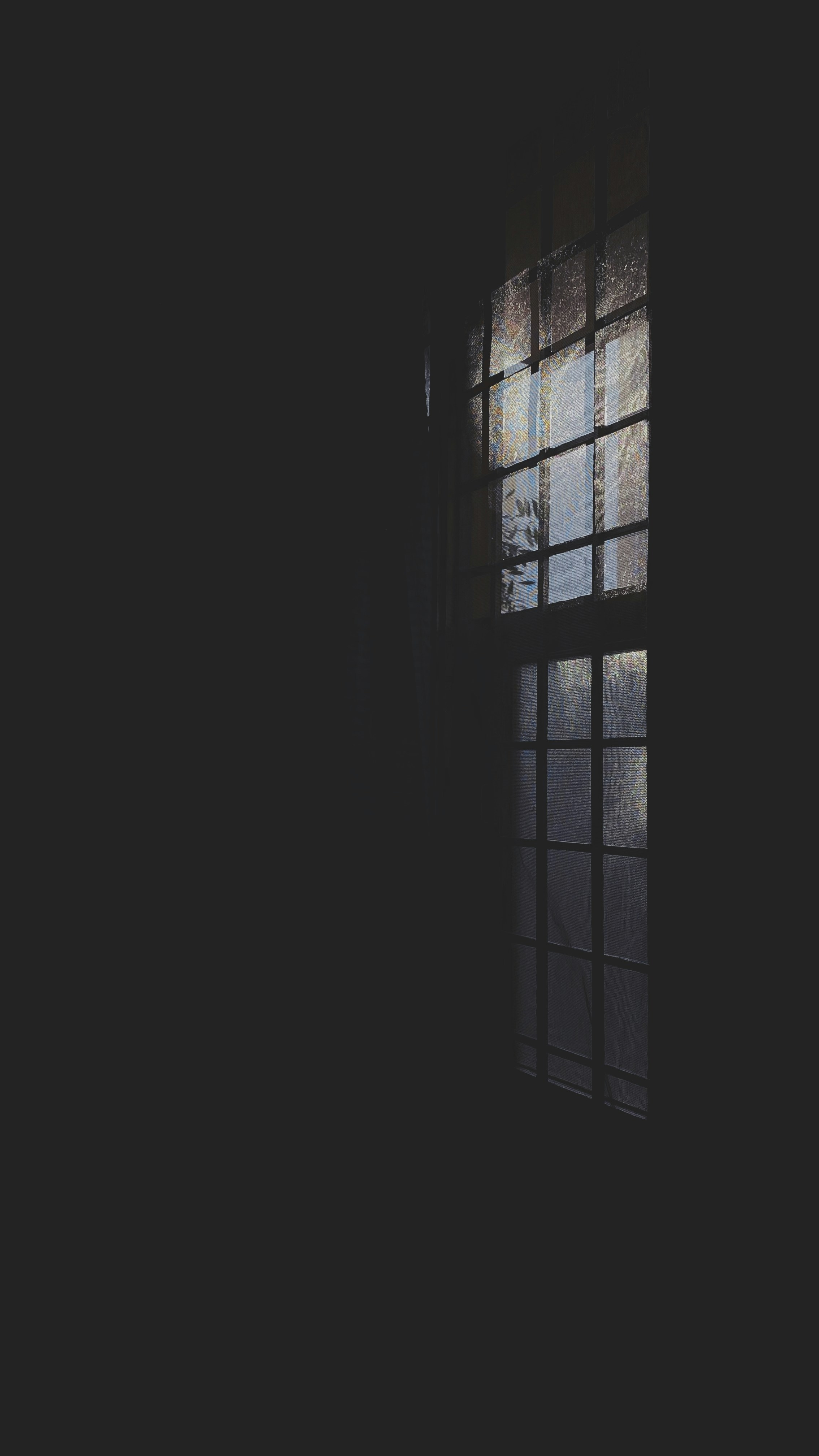 black wooden framed glass window