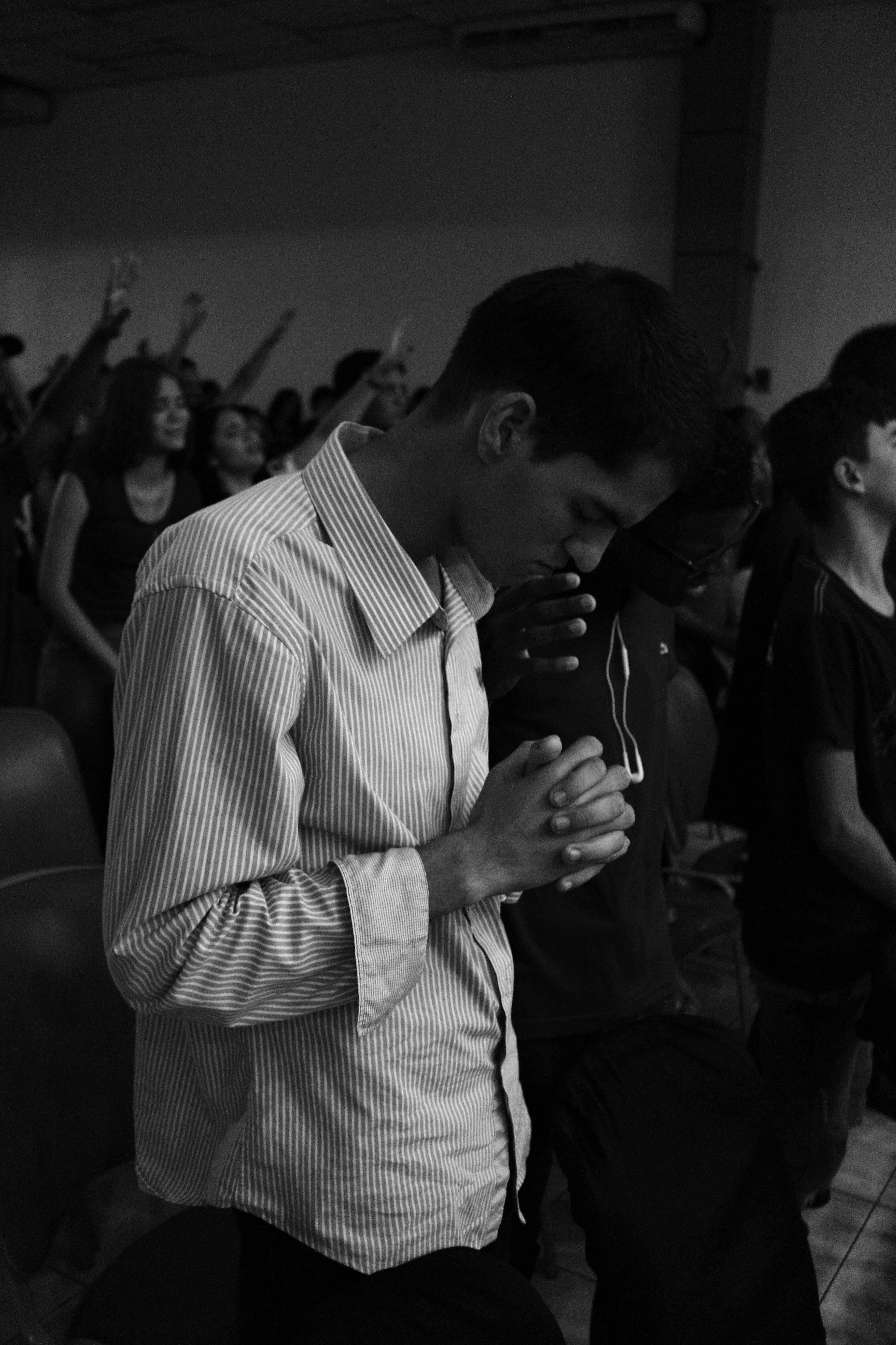 man in white and black striped dress shirt