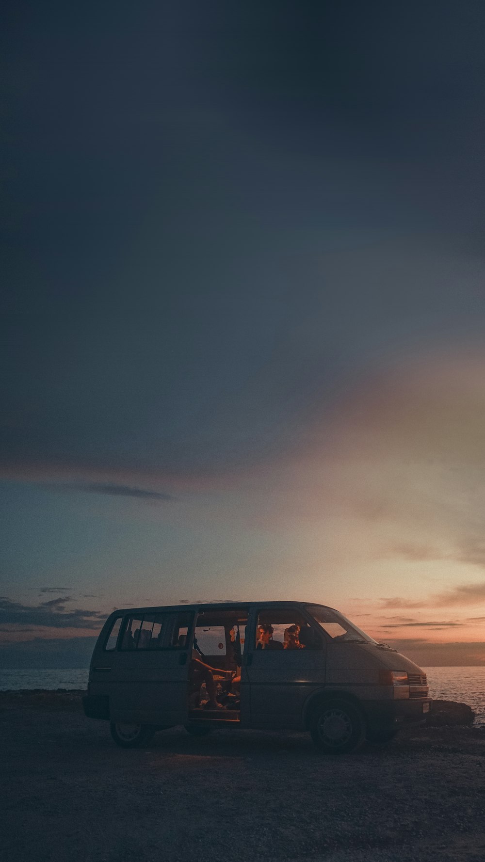 black van under gray sky