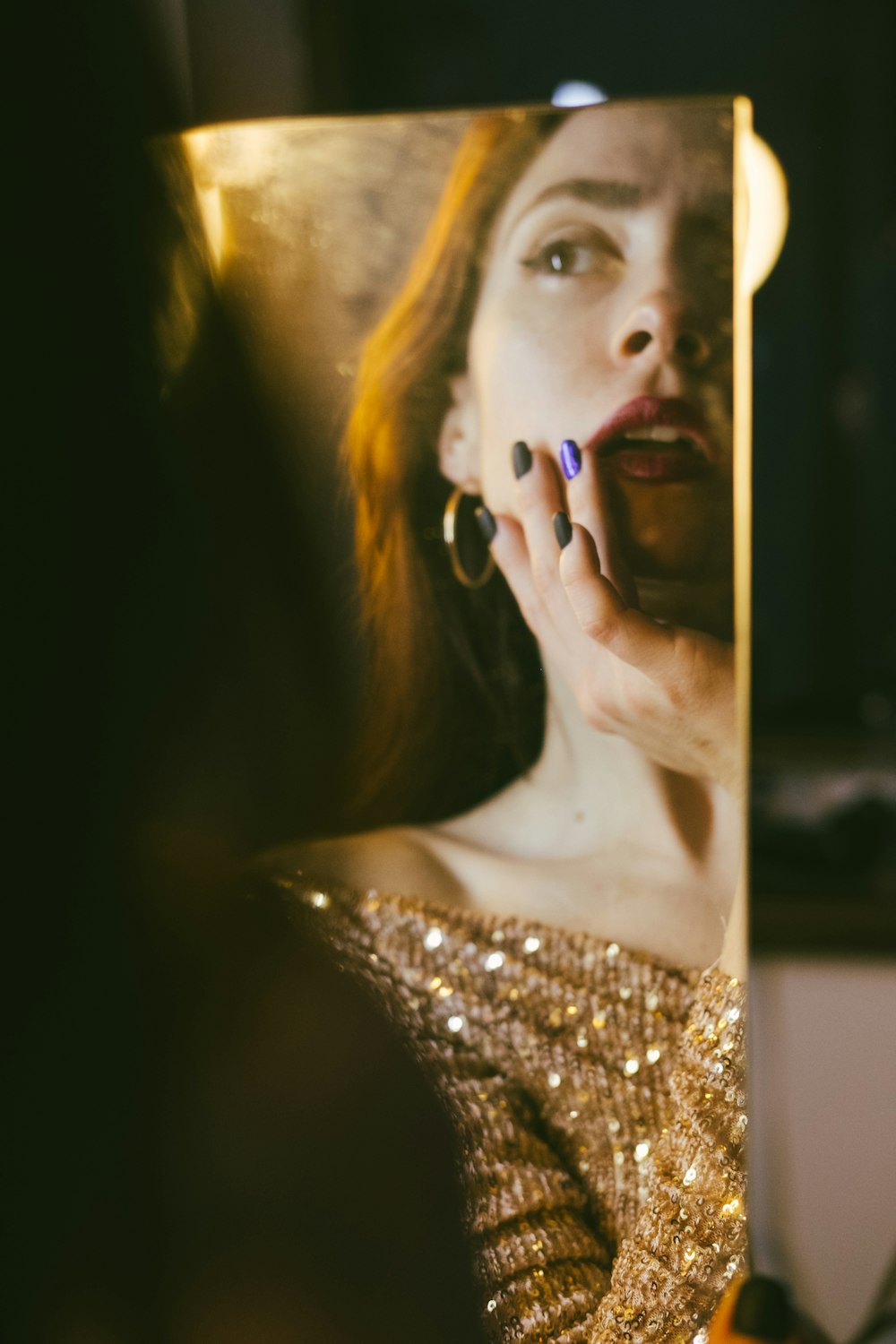 woman in gold and silver tube dress