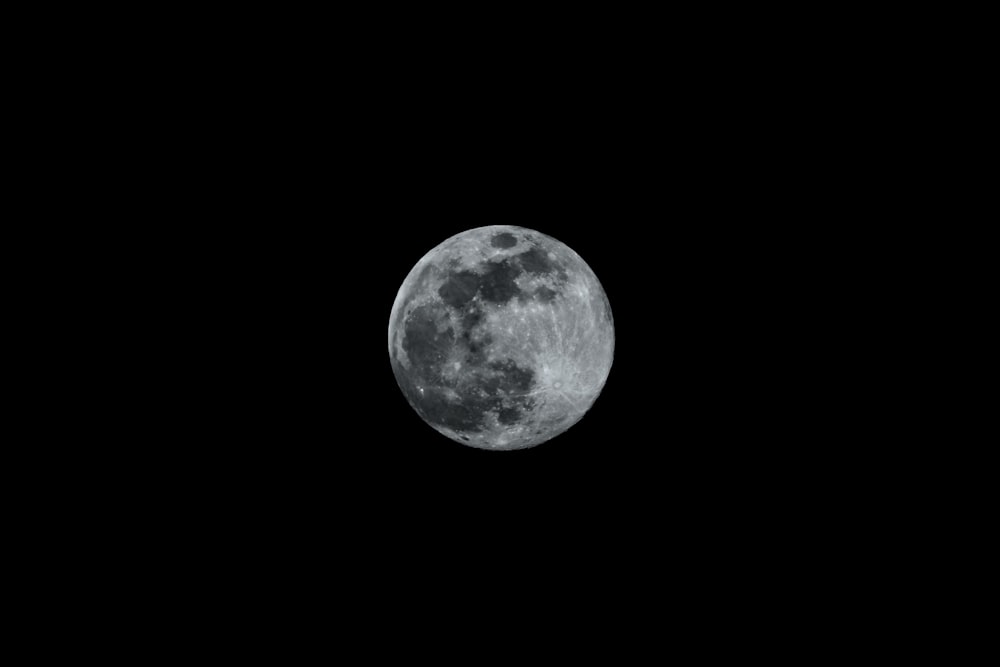 full moon in dark night sky