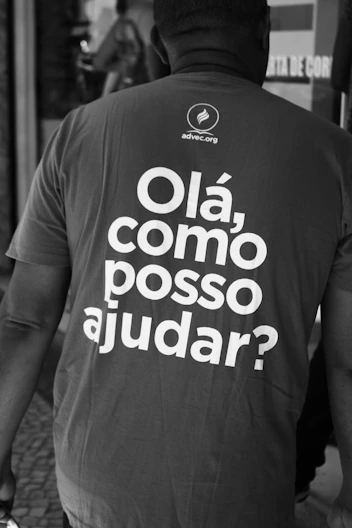grayscale photo of man in t-shirt