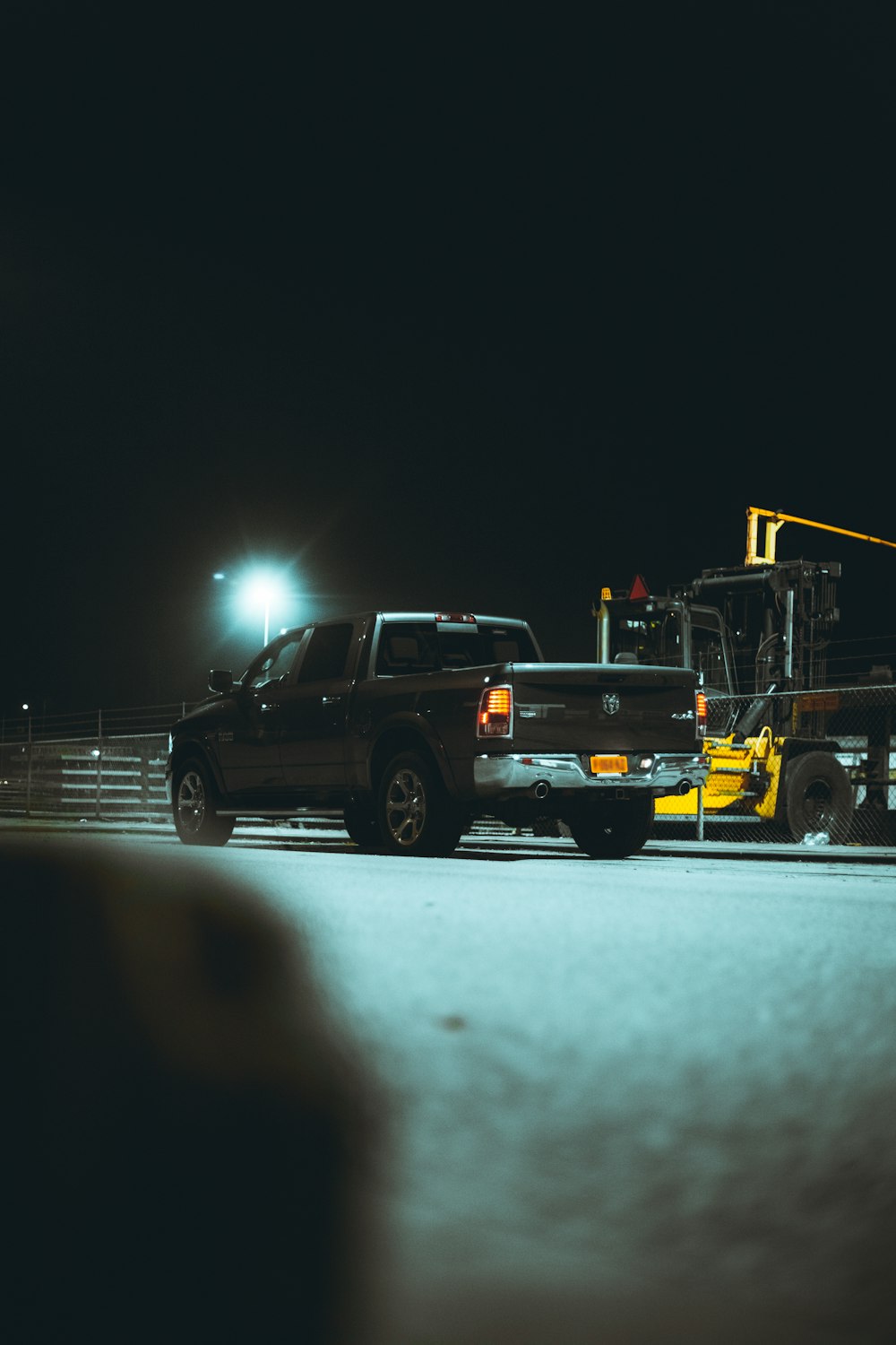 black suv on road during night time