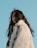 woman in white fur coat