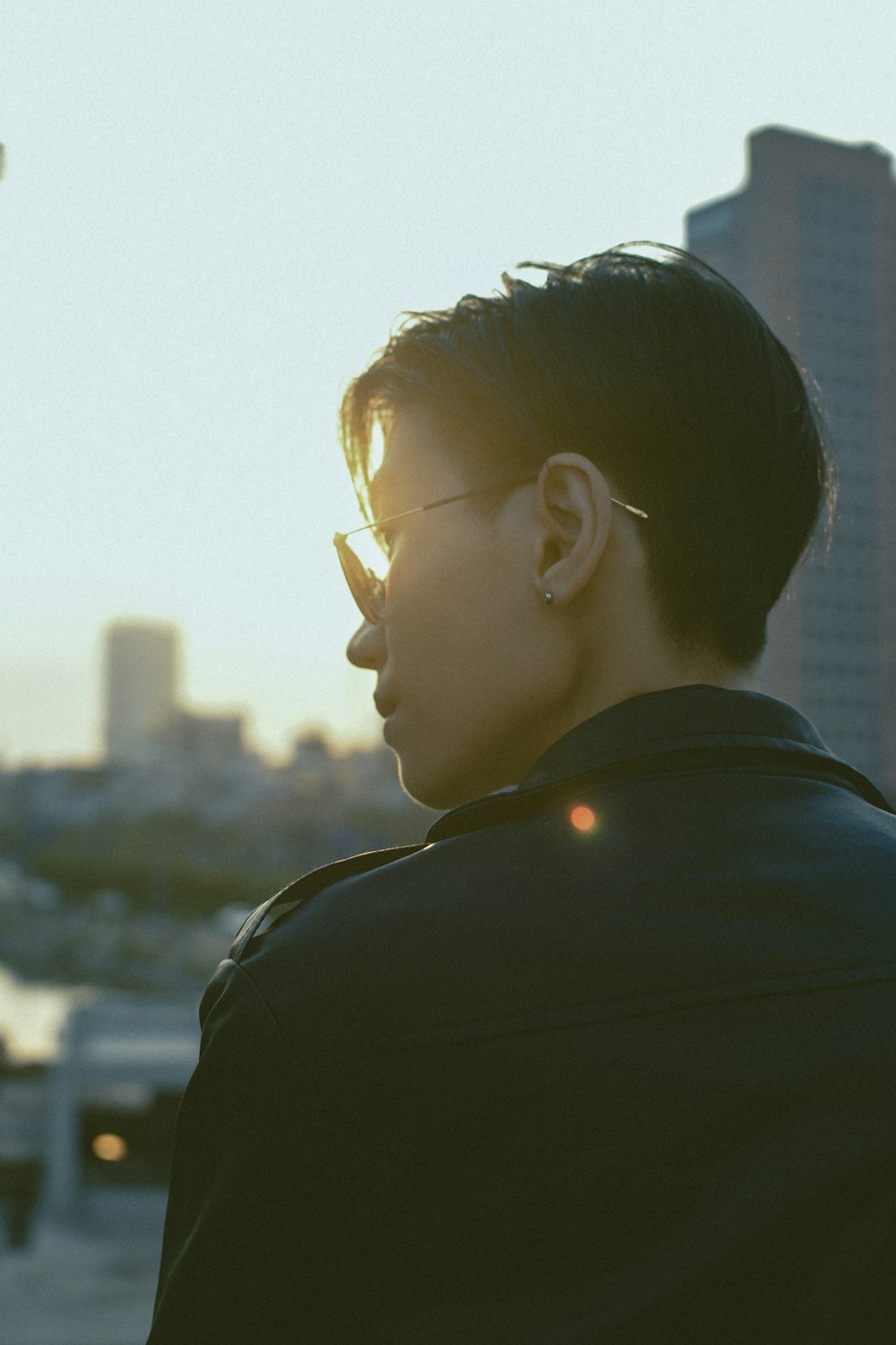 woman in black shirt wearing eyeglasses