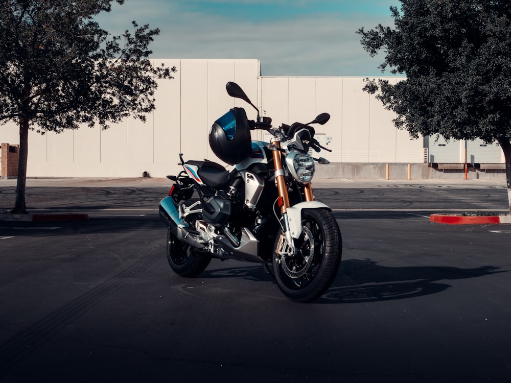 man in black jacket riding on black motorcycle