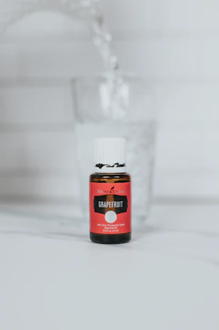 black and red labeled bottle