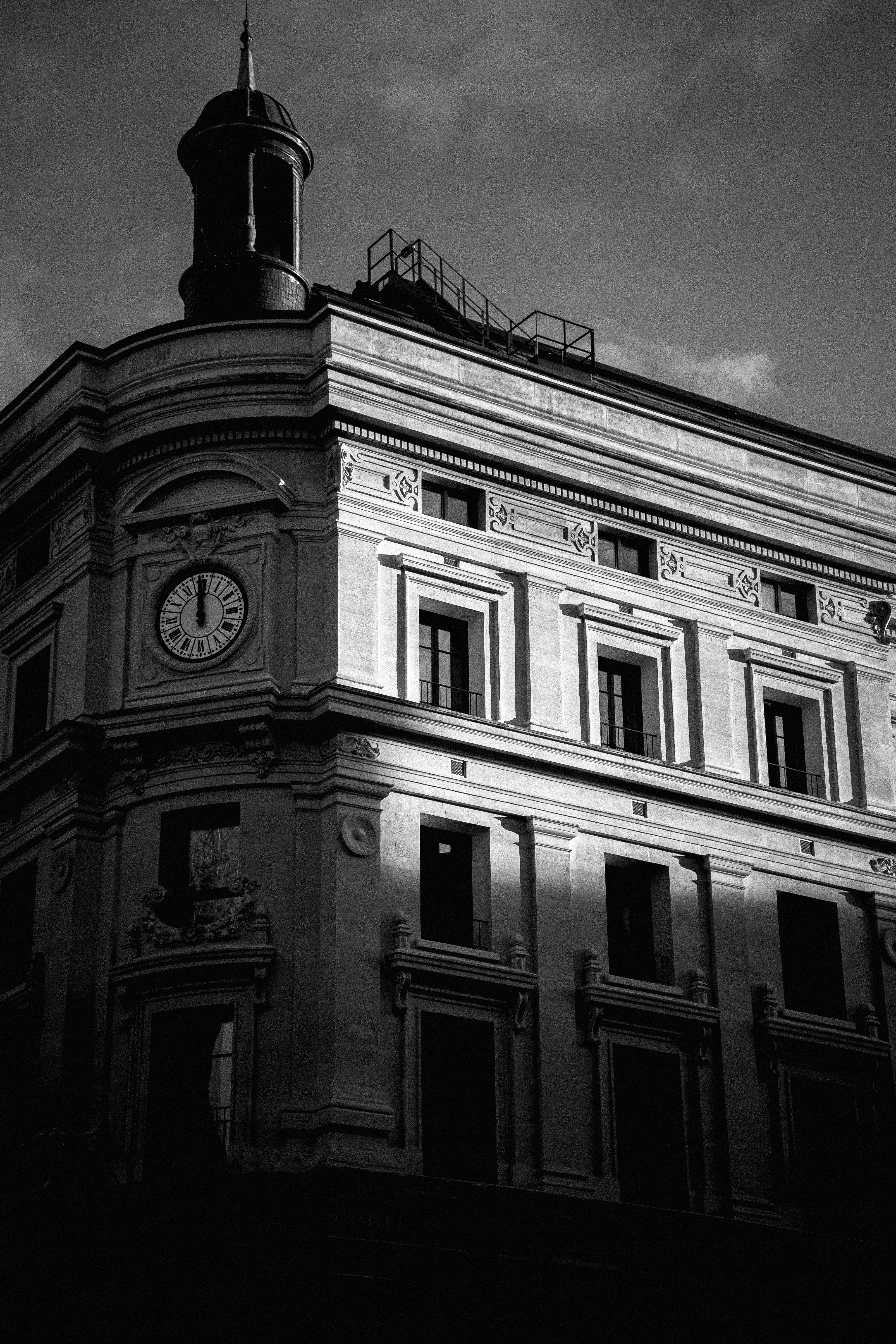 grayscale photo of concrete building