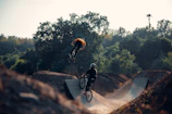 Riders practicing tricks together during a bright afternoon at Ruckstrack