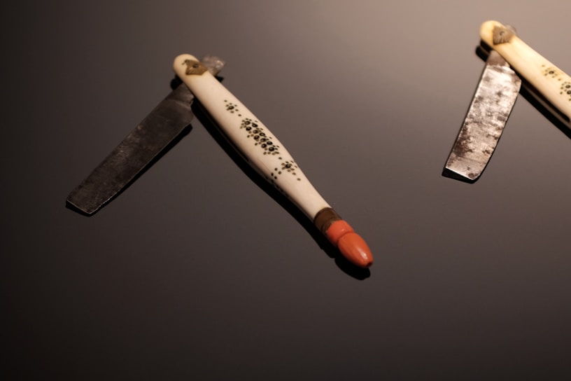 A collection of handcrafted razors displayed elegantly.