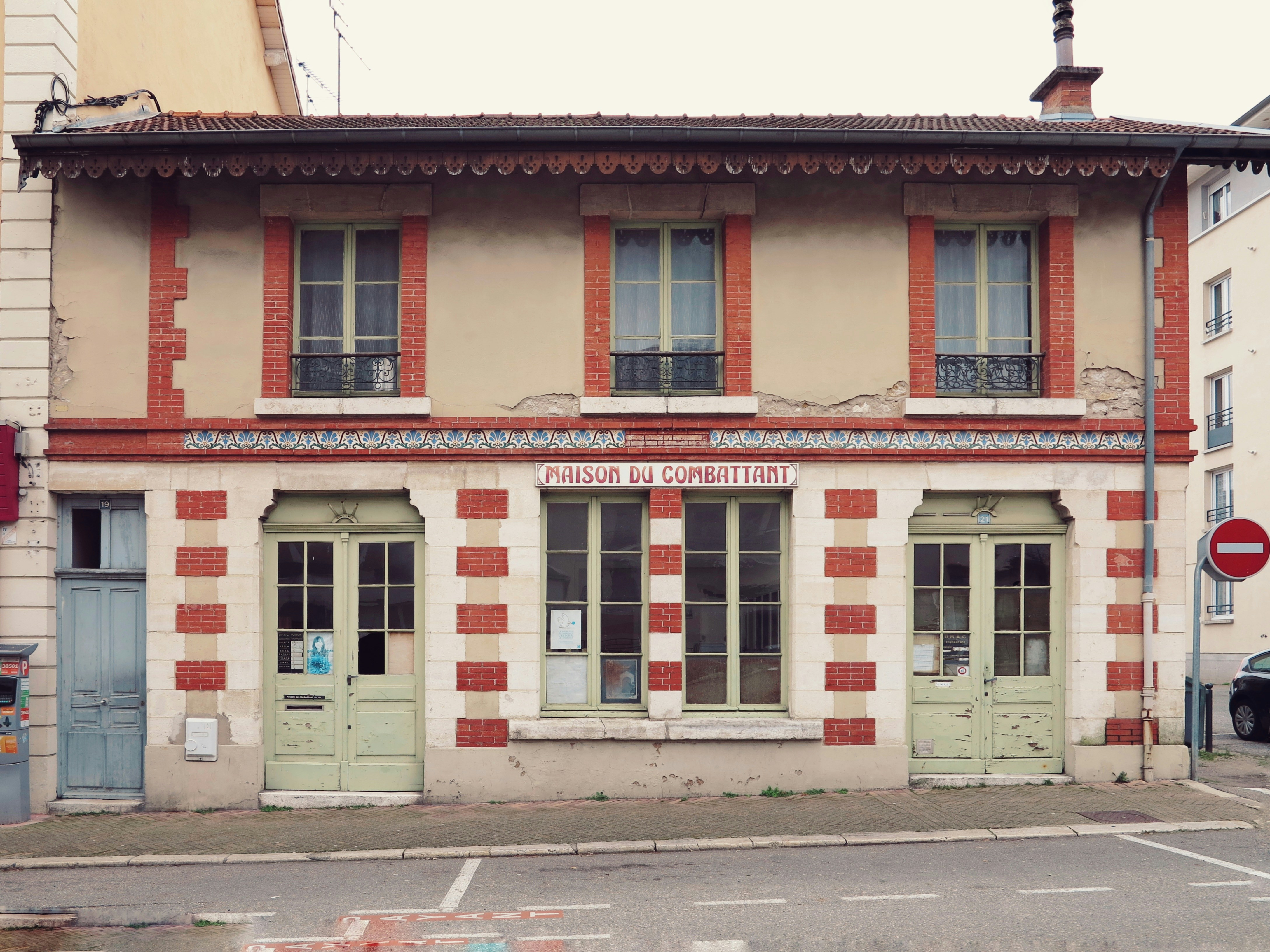 red and white concrete building during daytime