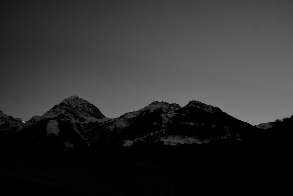 snow covered mountain during daytime