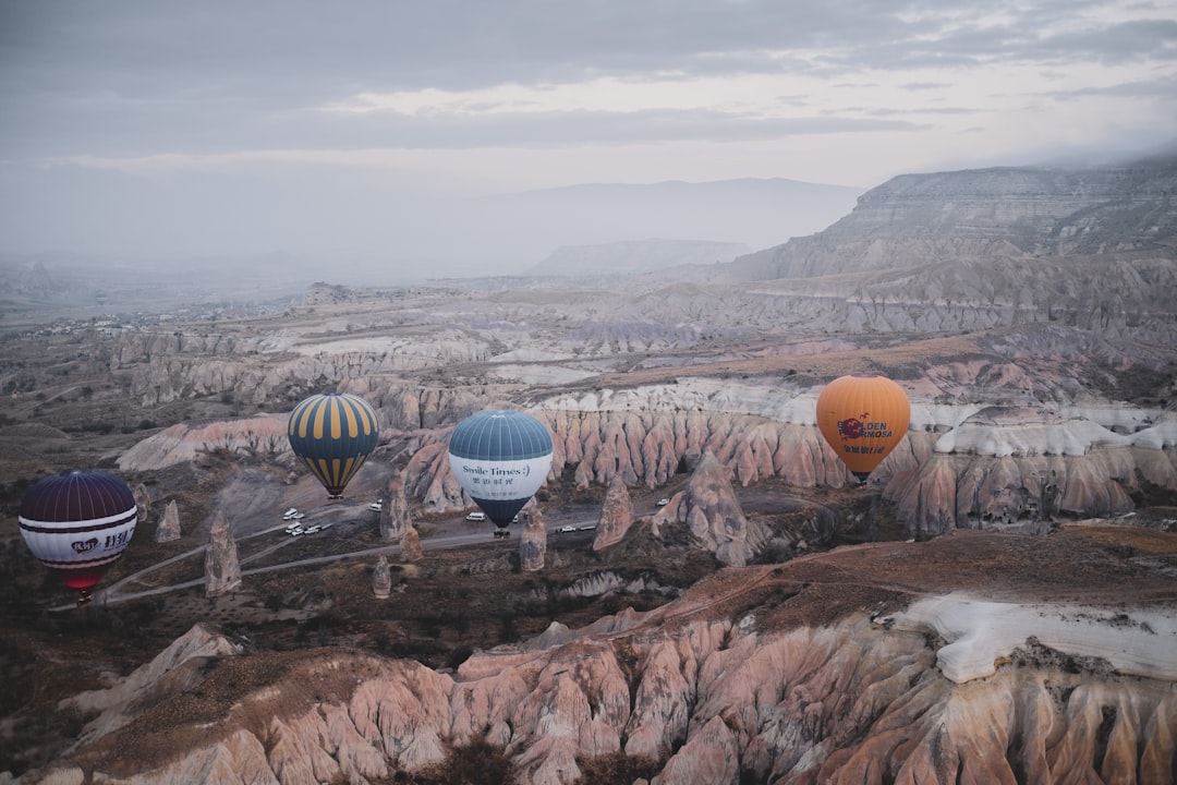 hot air balloons on the top of the mountain