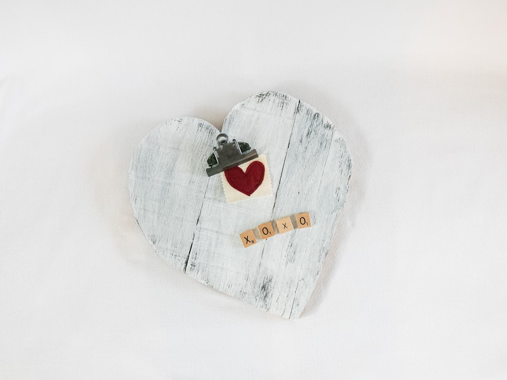 heart shaped gray wooden heart shaped ornament