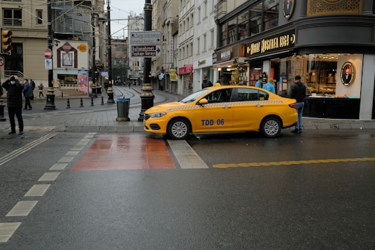 yellow car on road during daytime