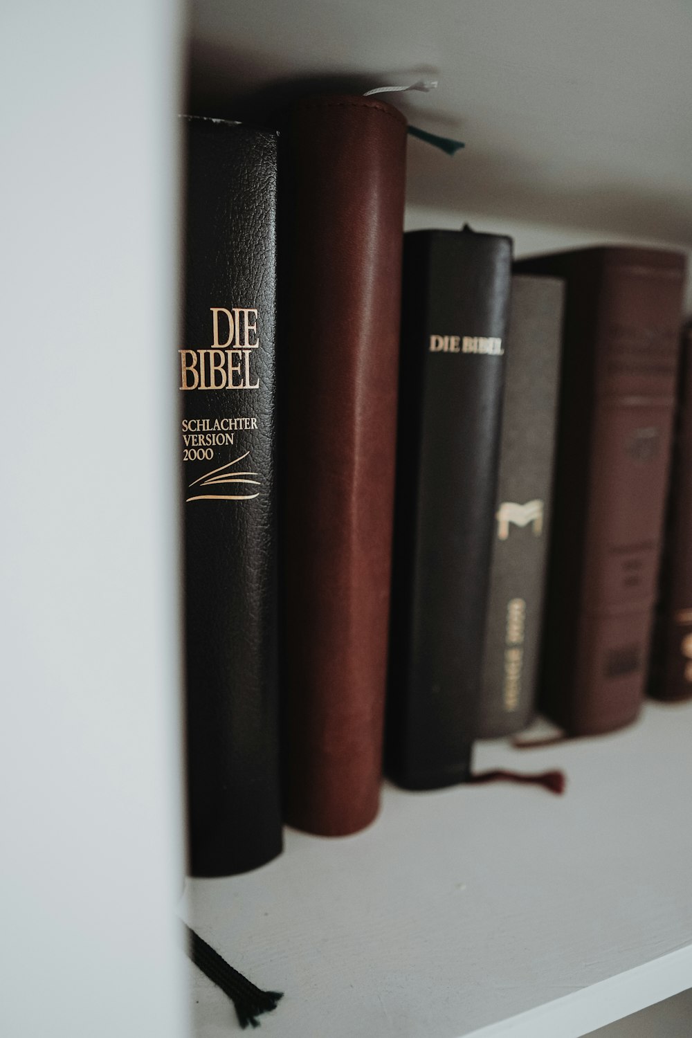 black and brown book on white table