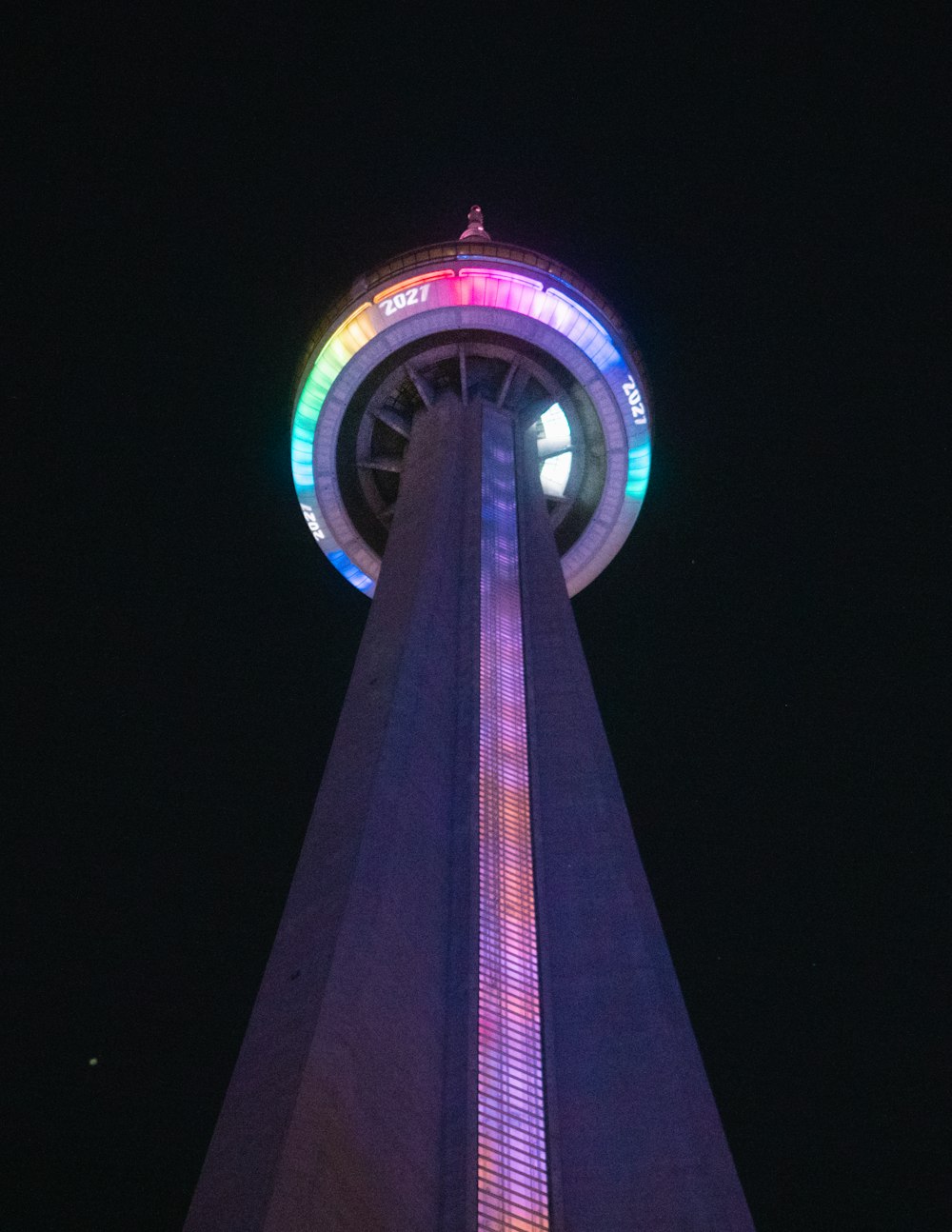 black and purple tower during night time