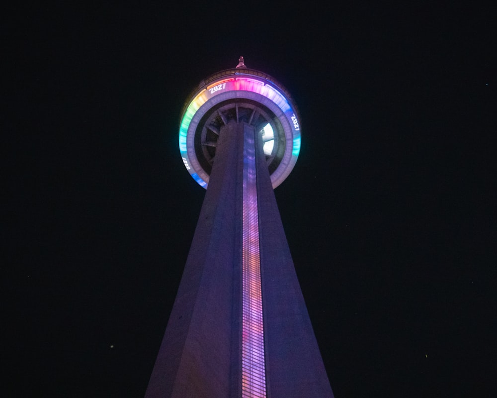 black and purple tower during night time