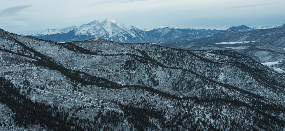 black and white mountains under white sky during daytime