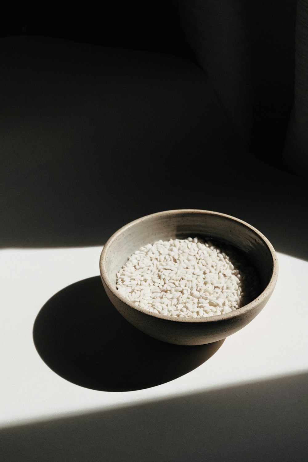 brown ceramic bowl with brown powder