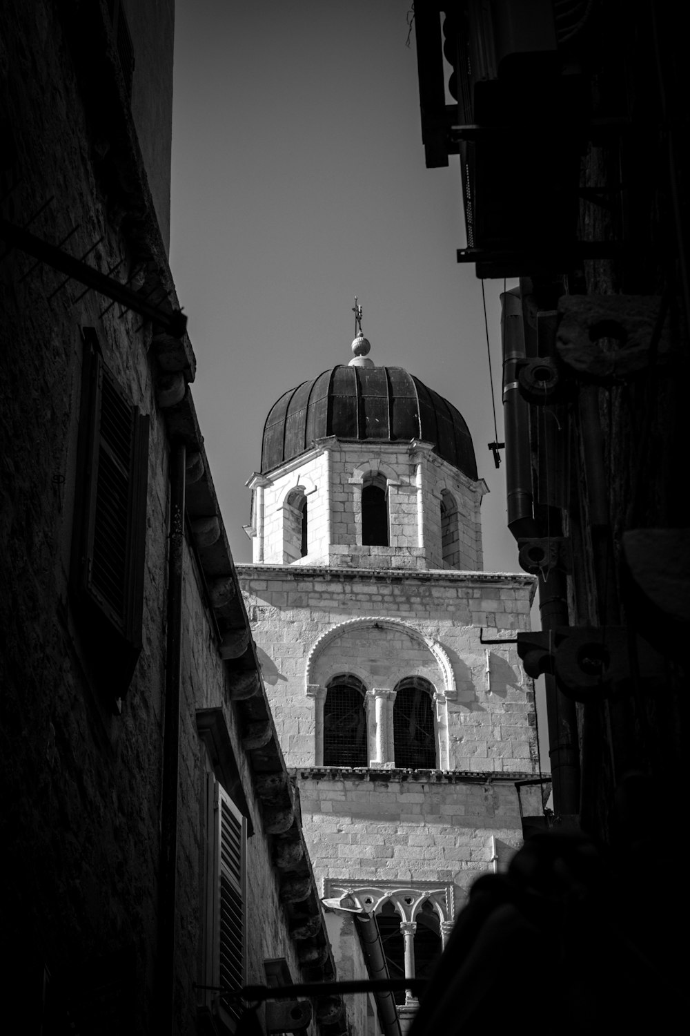 grayscale photo of concrete building