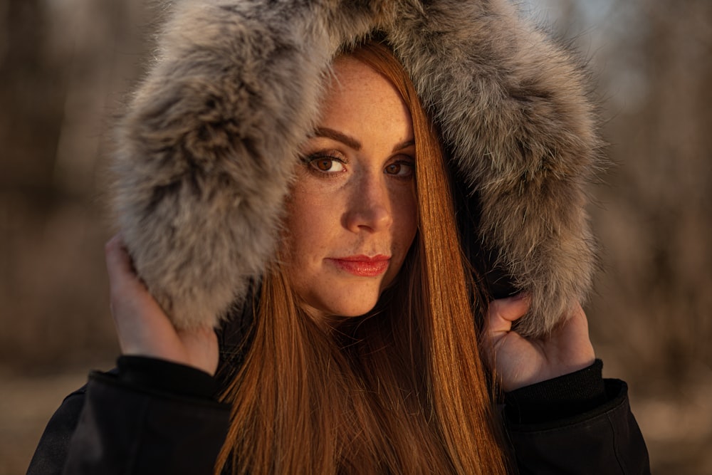 woman in black and gray fur coat