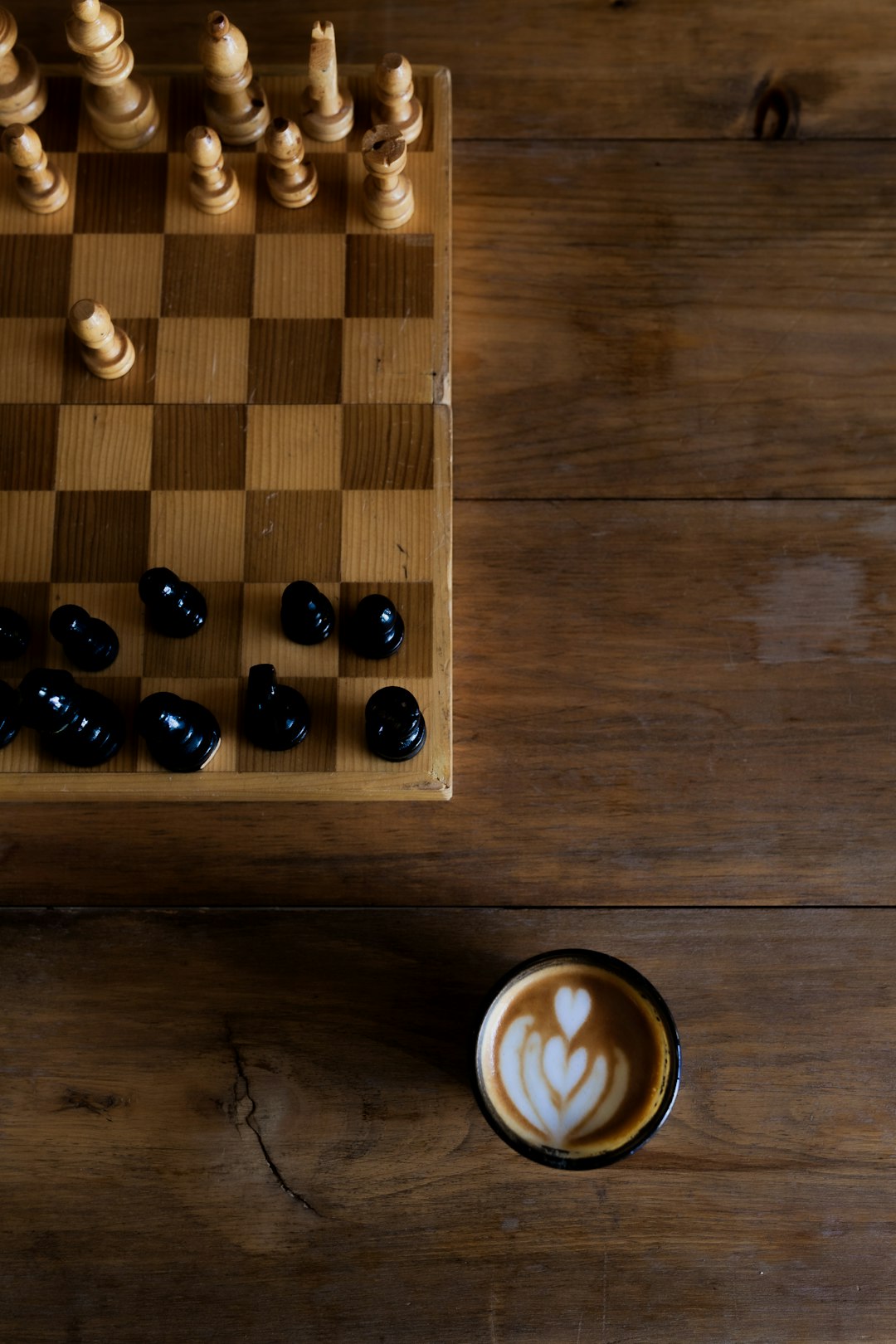 black beads on brown wooden table