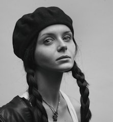 Black and white portrait of Juan Baraza embodying a complex character.